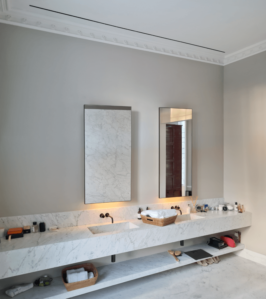 Discreet single slot bathroom ventilation in a luxury coastal villa in the Channel Islands
