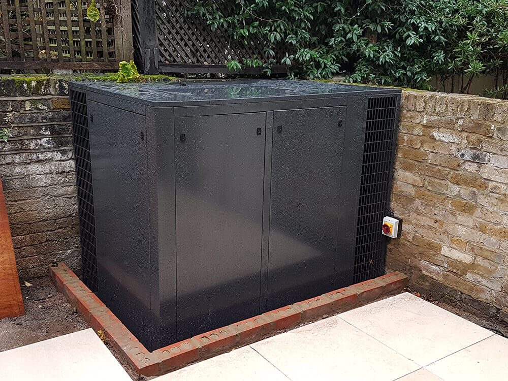 External acoustic enclosure housing air conditioning equipment for silent operation