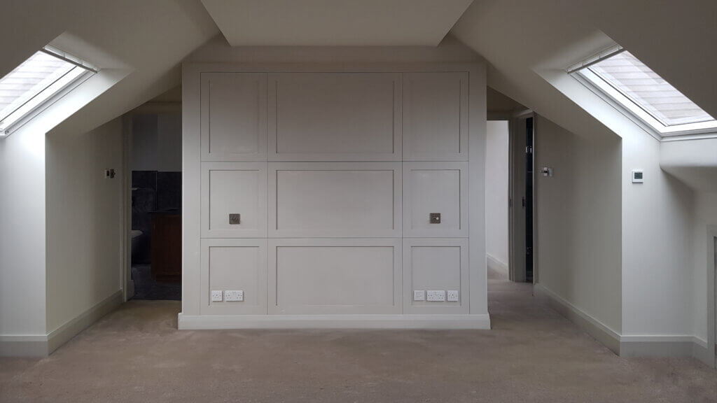 Bespoke bedroom joinery in a Wimbledon residence concealing equipment for air conditioning