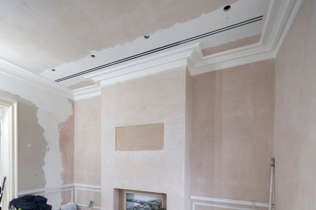 Twin slot diffusers in the ceiling for air conditioning to a luxury Holland Park apartment
