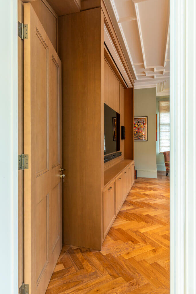 Neat air conditioning slot in joinery in a luxury townhouse in Hampstead
