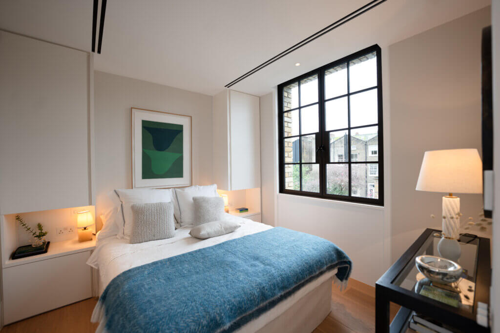 Twin slot diffuser for architecturally integrated air conditioning in a luxury Kensington bedroom